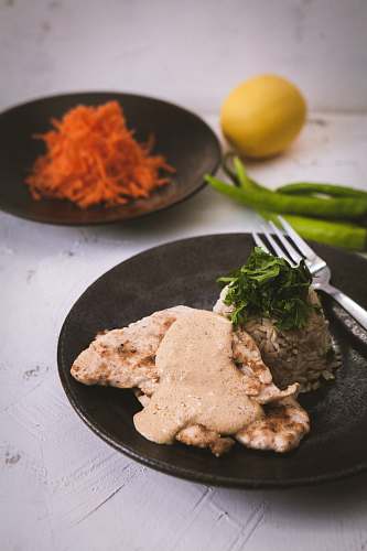 cutlery cooked meat serve on brown plate fork