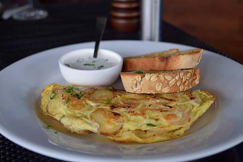 pizza cooked omelette and bread bread