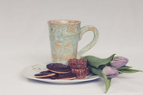 cookie cookies beside ceramic mug tea