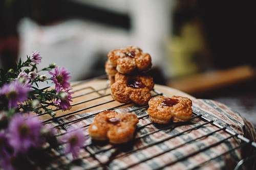 cookie cookies beside purple flower cookies