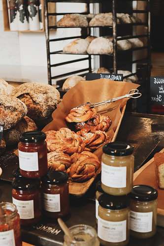 bread croissants and glass jars bun