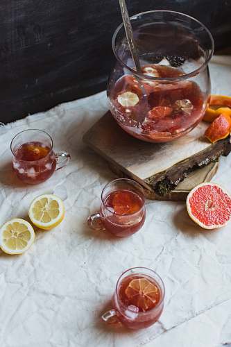 fruit cup of juice on white textile plant