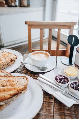 breakfast cup of latte and sliced breads london