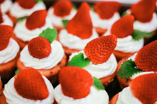 creme cupcake with strawberry cream