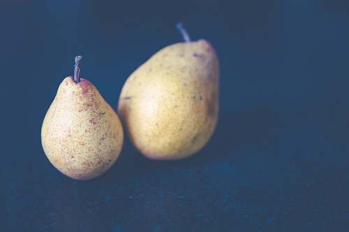 fruit filtered photography of two pear fruits pear