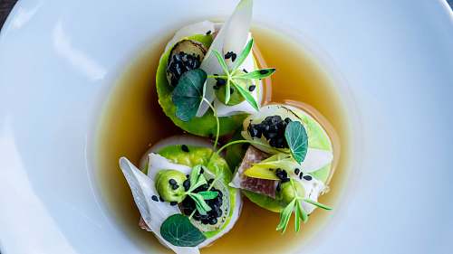 meal flat-lay photography of avocado and berries dish