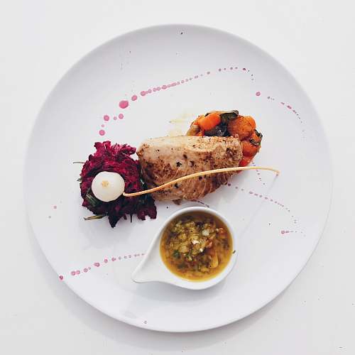 meal flat-lay photography of cooked meat and sauce platter plate