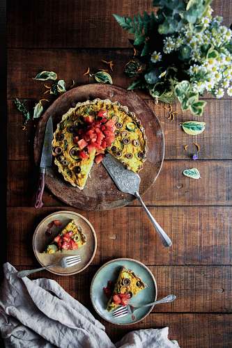 breakfast flat lay photography of pie with strawberry and olives toppings pottery