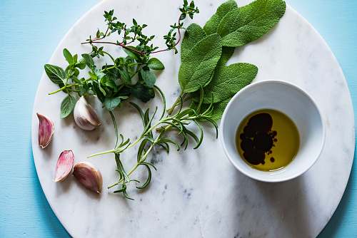 garlic flat lay photography of spices on plate flora