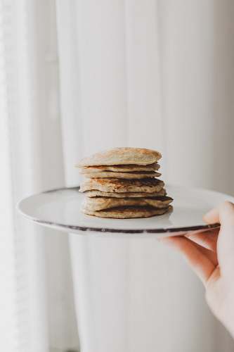bread flatbread on white plate human