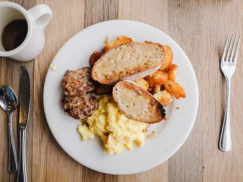 bread French bread and mashed potato on white ceramic plate toast