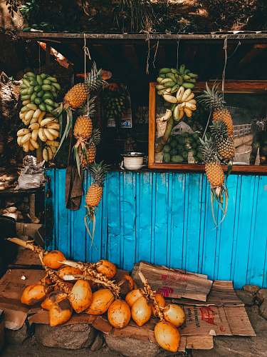 plant fruits hanged on string at stall during daytime fruit