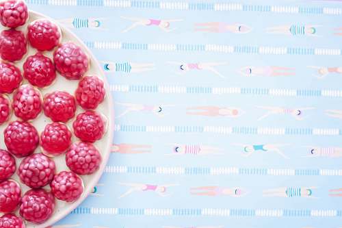 confectionery fruits on plate on table sweets