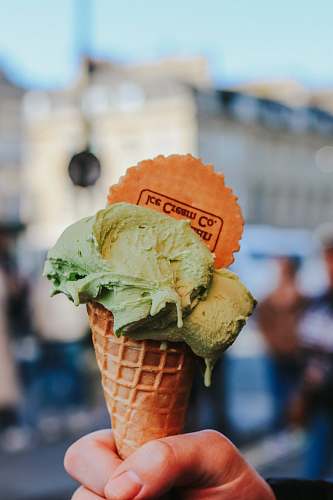 cream green ice cream in cone in macro photography creme