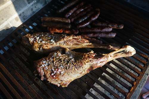 bbq grilled chicken on brown steel griller majorca