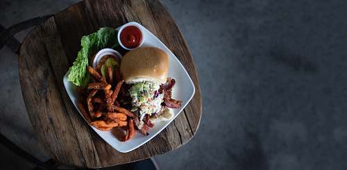 meal hamburger and fries on ceramic plate sandwich