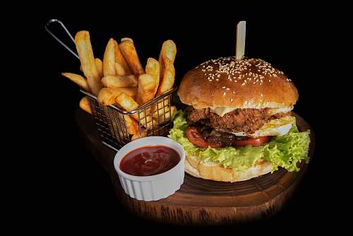 burger hamburger beside fries and ketchup fries