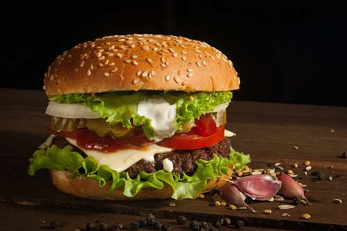 burger hamburger with vegetables on wooden surface animal
