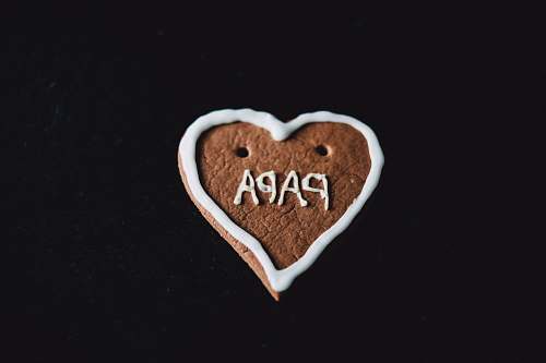 confectionery heart-shaped cookie with papa decoration sweets