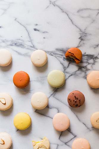 flat macarons on gray table sweet