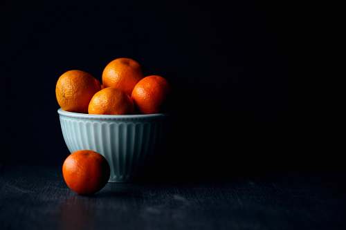 fruit orange fruit in white ceramic bowl plant