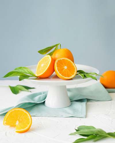 fruit orange fruit in white ceramic plate close-up photography citrus fruit