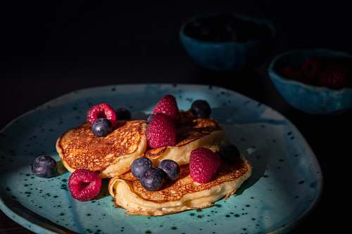 bread pancake with berries on plate pancake