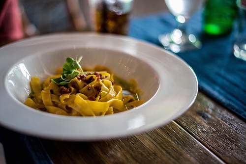 plate pasta with sauce in white ceramic bowl pasta
