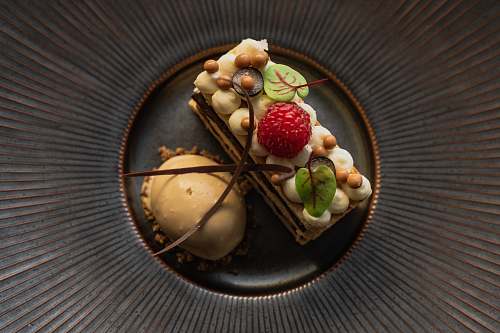 confectionery pasty near caramel ice cream on plate sweets