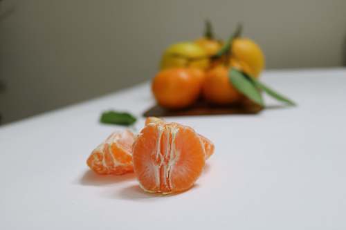 plant peeled orange fruit shallow focus photography citrus fruit