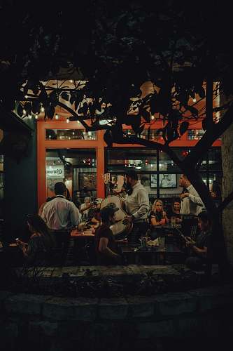 restaurant people playing instruments food court