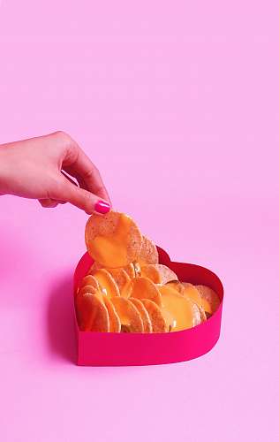 sweets person holding biscuit confectionery