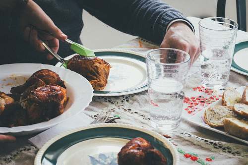 meal person holding cooked food with tongs dinner