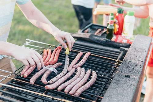 bbq person holding fork and knife human