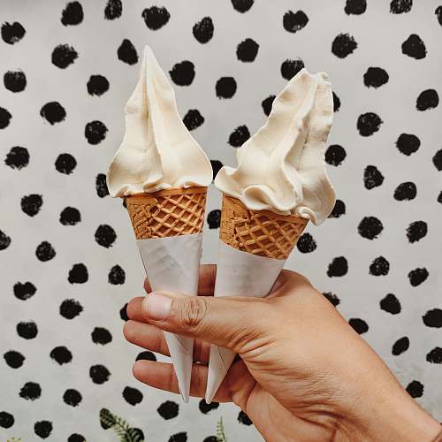 dessert person holding ice creams cream