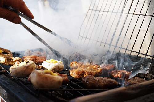 bbq person holding tong istanbul