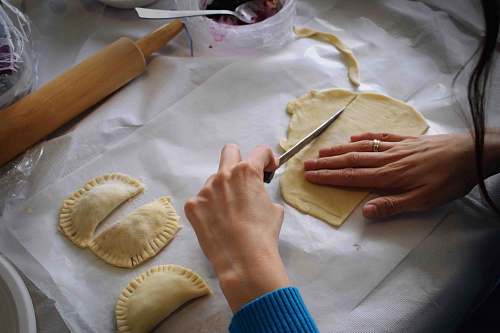 pasta person making Empanadas ravioli