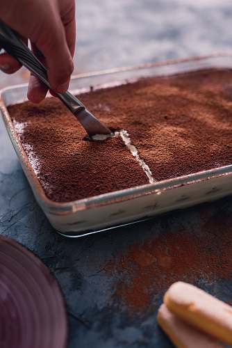 dessert person slicing pasrty chocolate