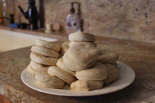 bread pile of unbaked bread slices on plate pita