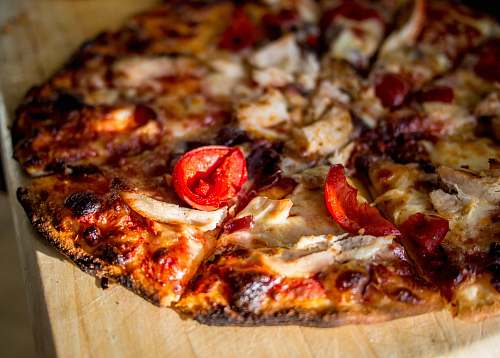 pizza pizza on wooden board tomato