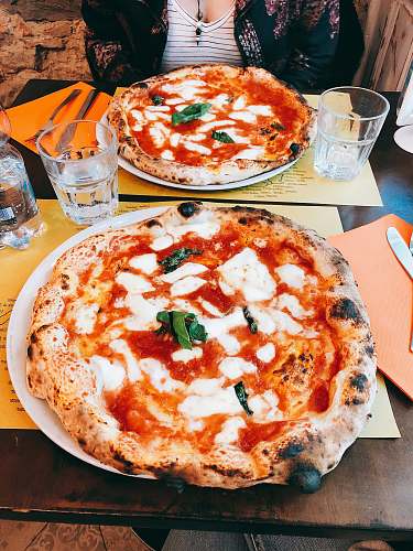 dish pizza with witrh sauce on table pizza
