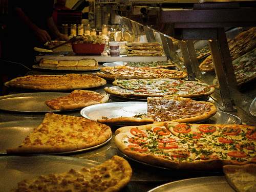 pizza pizzas on trays meal