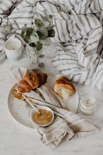 bread plate of baked bread croissant