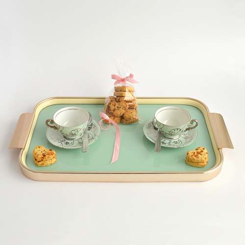 tray rectangular beige and green tea set and packed cookies tea