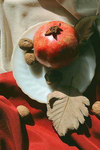 fruit red fruit on white ceramic plate apple