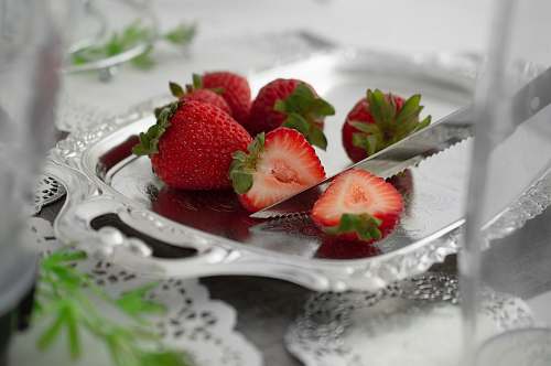 plant red strawberries on gray tray fruit