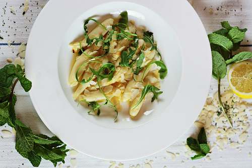 dish round white ceramic plate with pasta mint