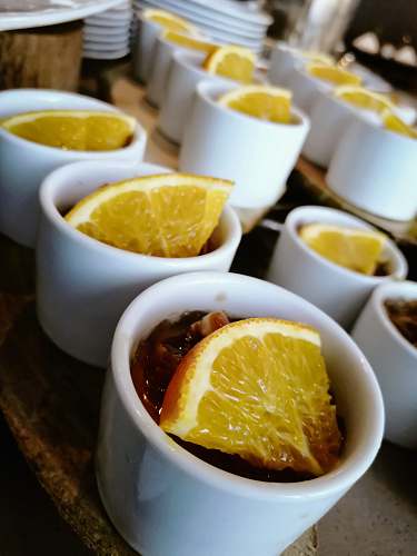 fruit round white cup with food and lemon citrus fruit