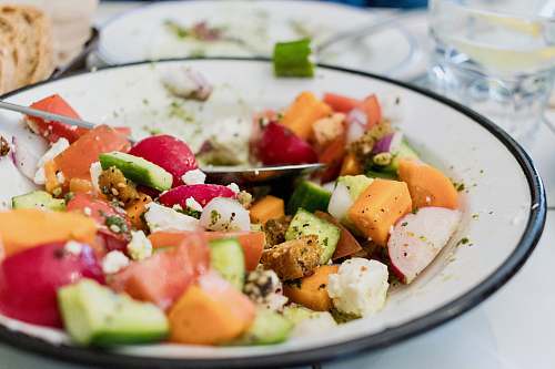 meal salad on round white plate salad