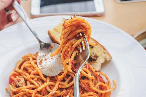 pasta selective focus photography of fork with spaghetti spaghetti